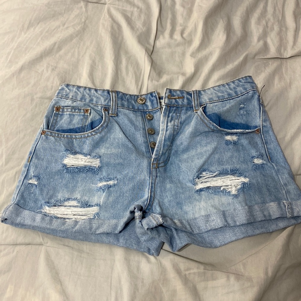 Light blue forever 21 Jean button up cuffed shorts. Size 27.